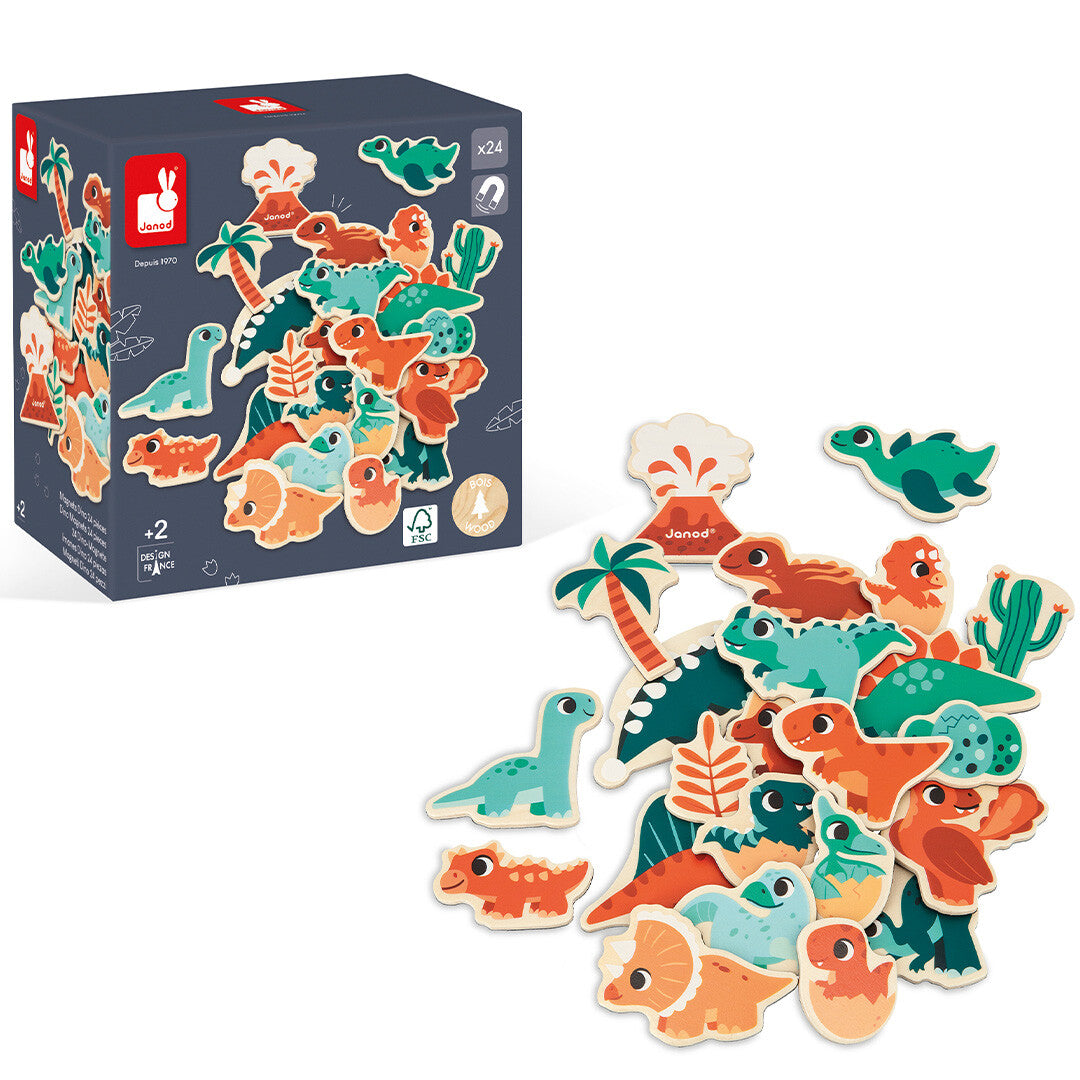De Janod verpakking van de dinosaurus magneten staat naast een hoopje van de houten dinosaurus magneten.