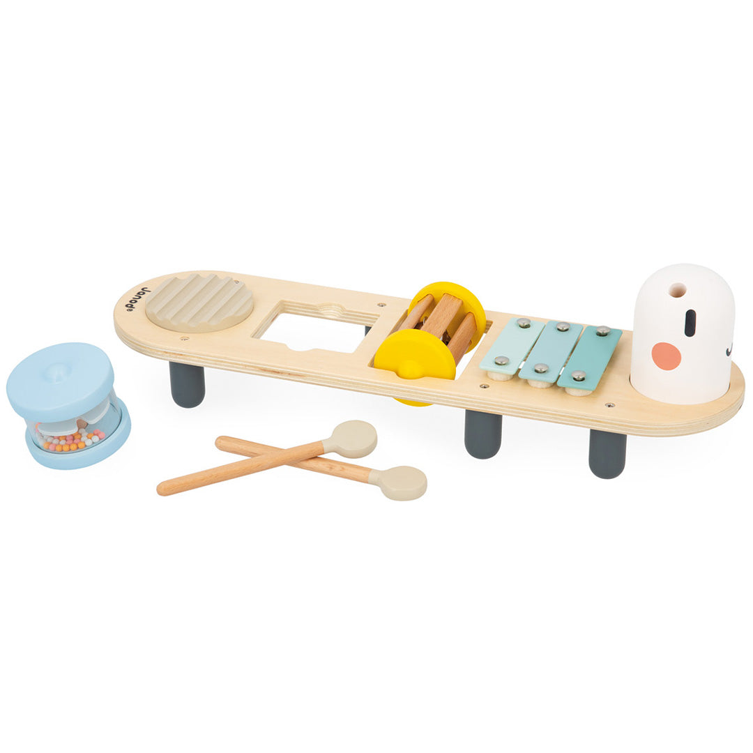 Janod houten muziektafel in de vorm van een rups met instrumenten, een losse rammelaar en twee stokjes.