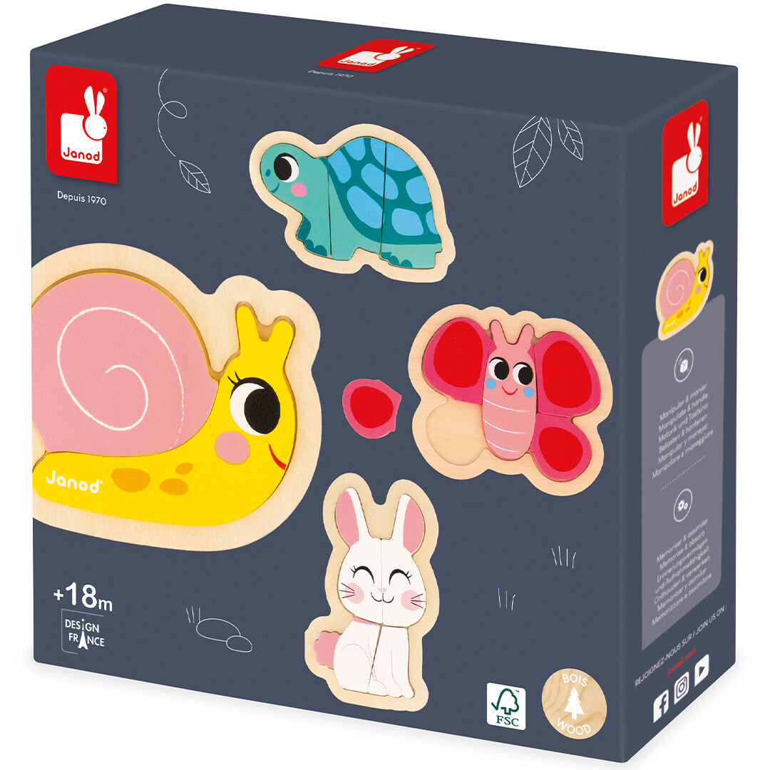 De verpakking van de Janod houten dierenpuzzels met afbeeldingen van de konijn-, vlinder-, slak- en schildpadpuzzels.