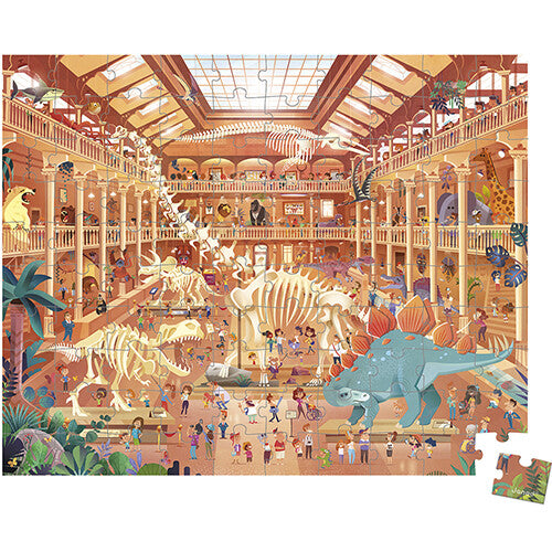 Voltooide legpuzzel van 100 stukjes met een natuurhistorisch museum vol dinosaurusskeletten en bezoekers.