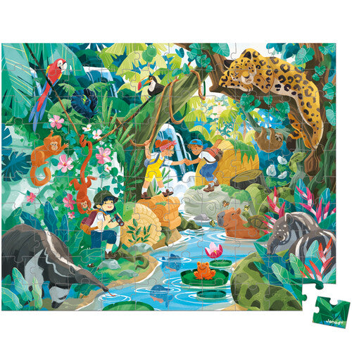 Janod kinderpuzzel van een jungle-avontuur met kinderen en diverse dieren bij een rivier.