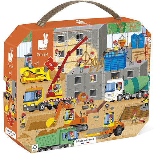 Janod puzzelverpakking met een illustratie van een bouwplaats vol voertuigen en bouwvakkers.