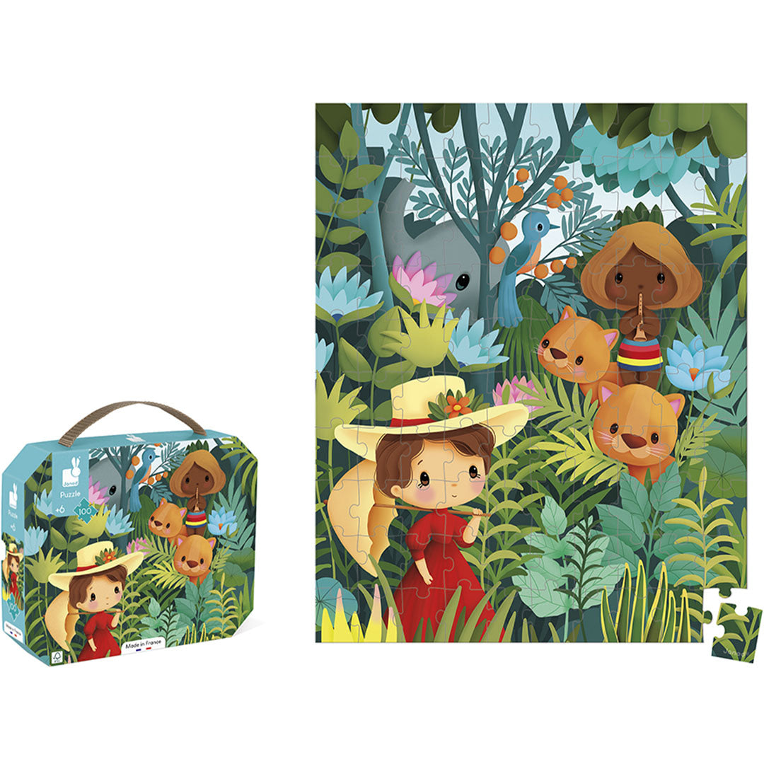 De Janod legpuzzel verpakking staat naast de complete puzzel met een jungle tafereel.