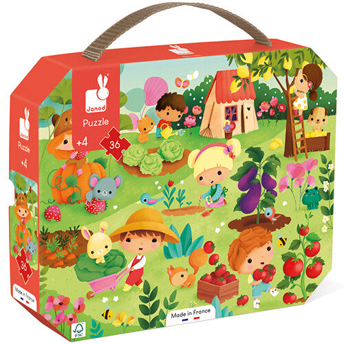 Janod puzzelverpakking met een illustratie van kinderen en dieren in een tuin.