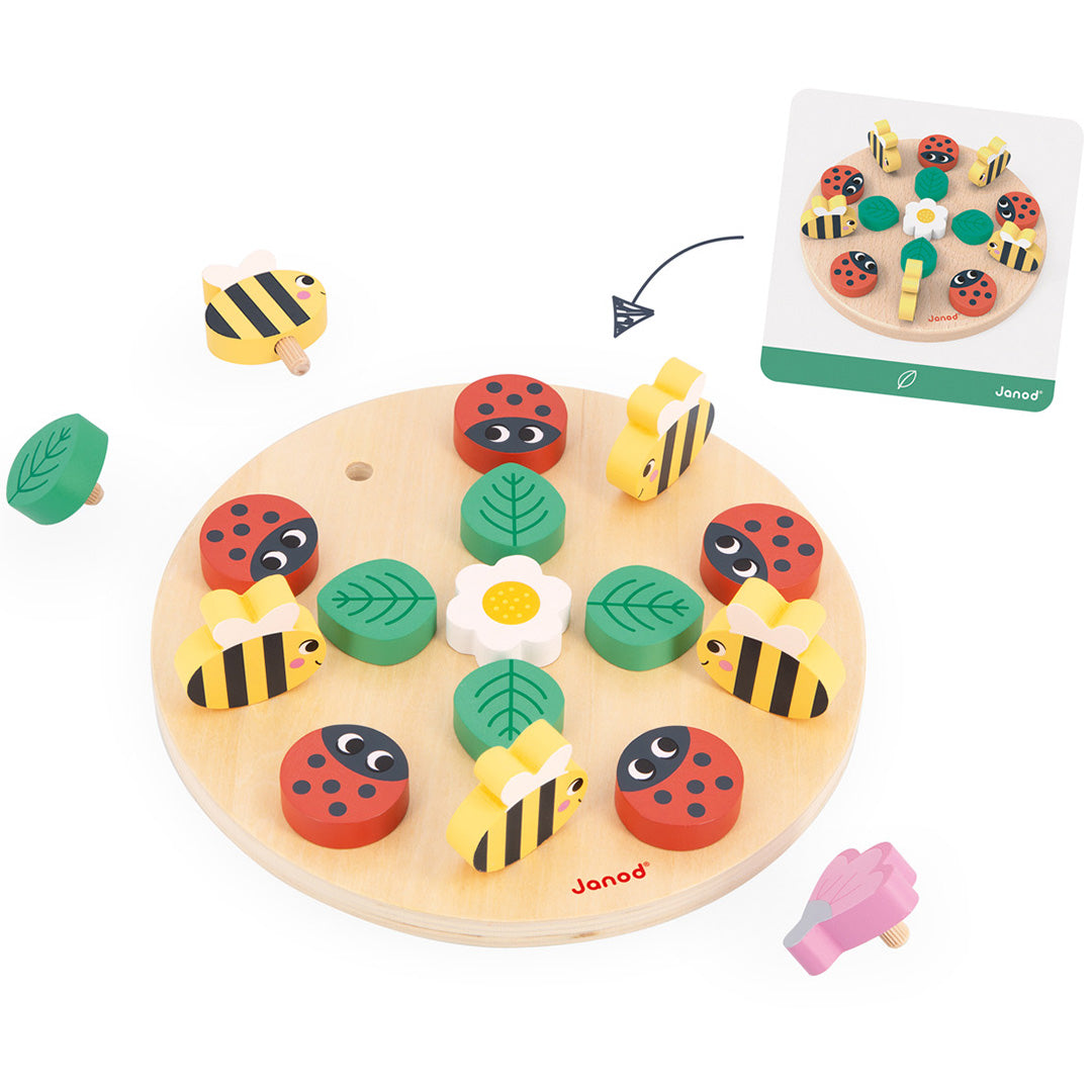 Janod houten mandala puzzelspel met lieveheersbeestjes, bijen, bladeren en bloemen op een ronde plaat, met een voorbeeldkaartje.