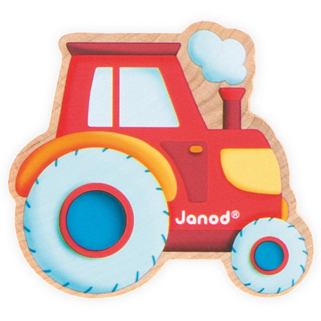 Een close-up van de Janod houten rijgkraal in de vorm van een rode tractor.