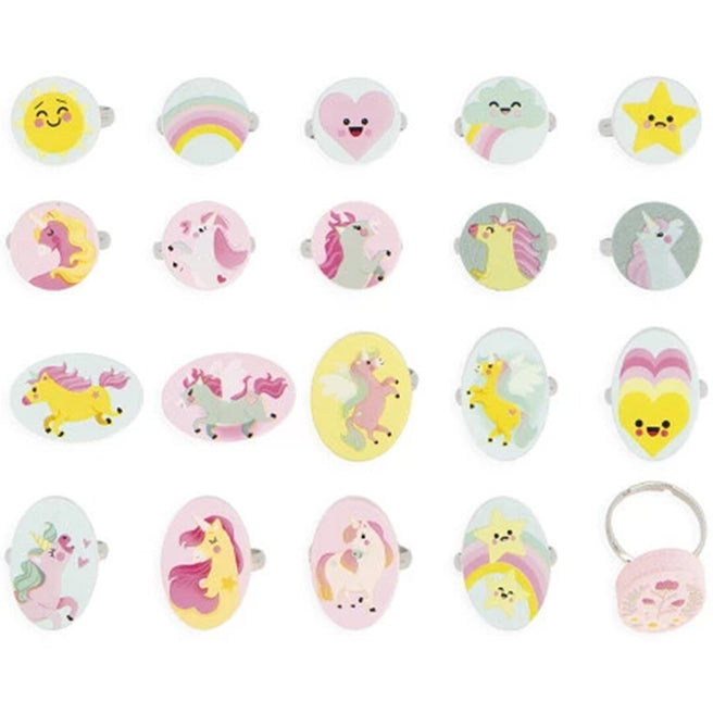 Een bovenaanzicht van 20 Janod kinderringen met diverse eenhoorn-, regenboog-, hart-, ster- en emoji-ontwerpen.