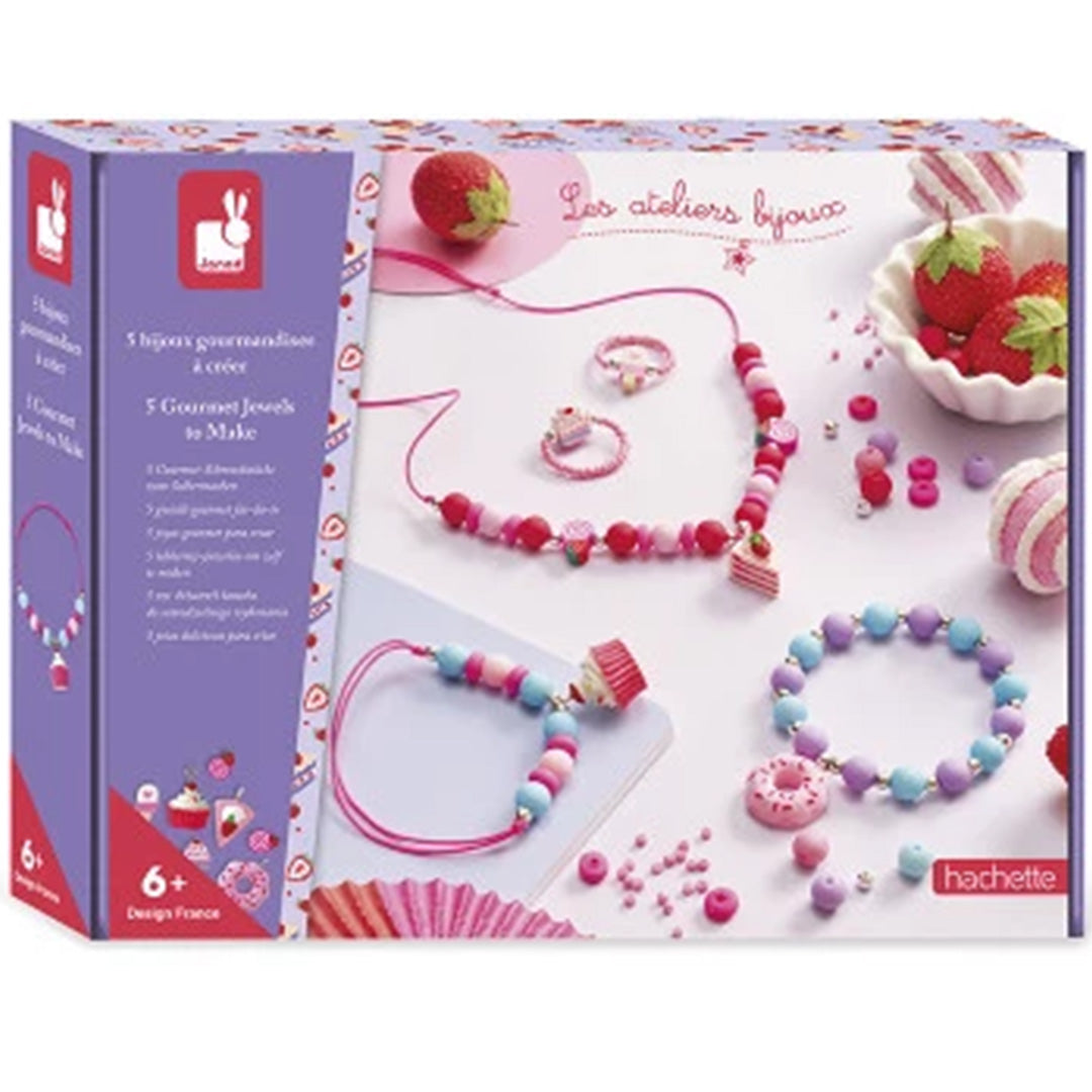 Verpakking van de Janod set om gastronomische sieraden te maken met zoete thema's.