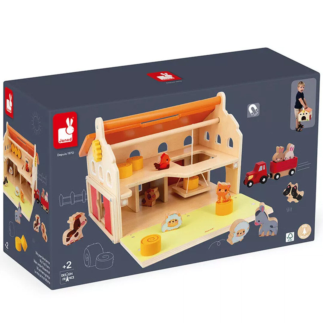 De verpakking van de Janod houten boerderij speelset met een afbeelding van het speelgoed.