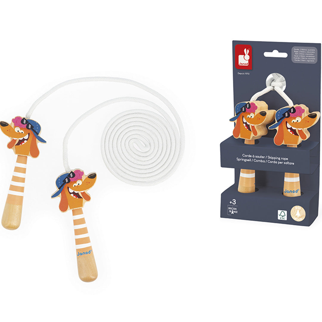Janod springtouw met hondenkoppen naast de donkerblauwe productverpakking.