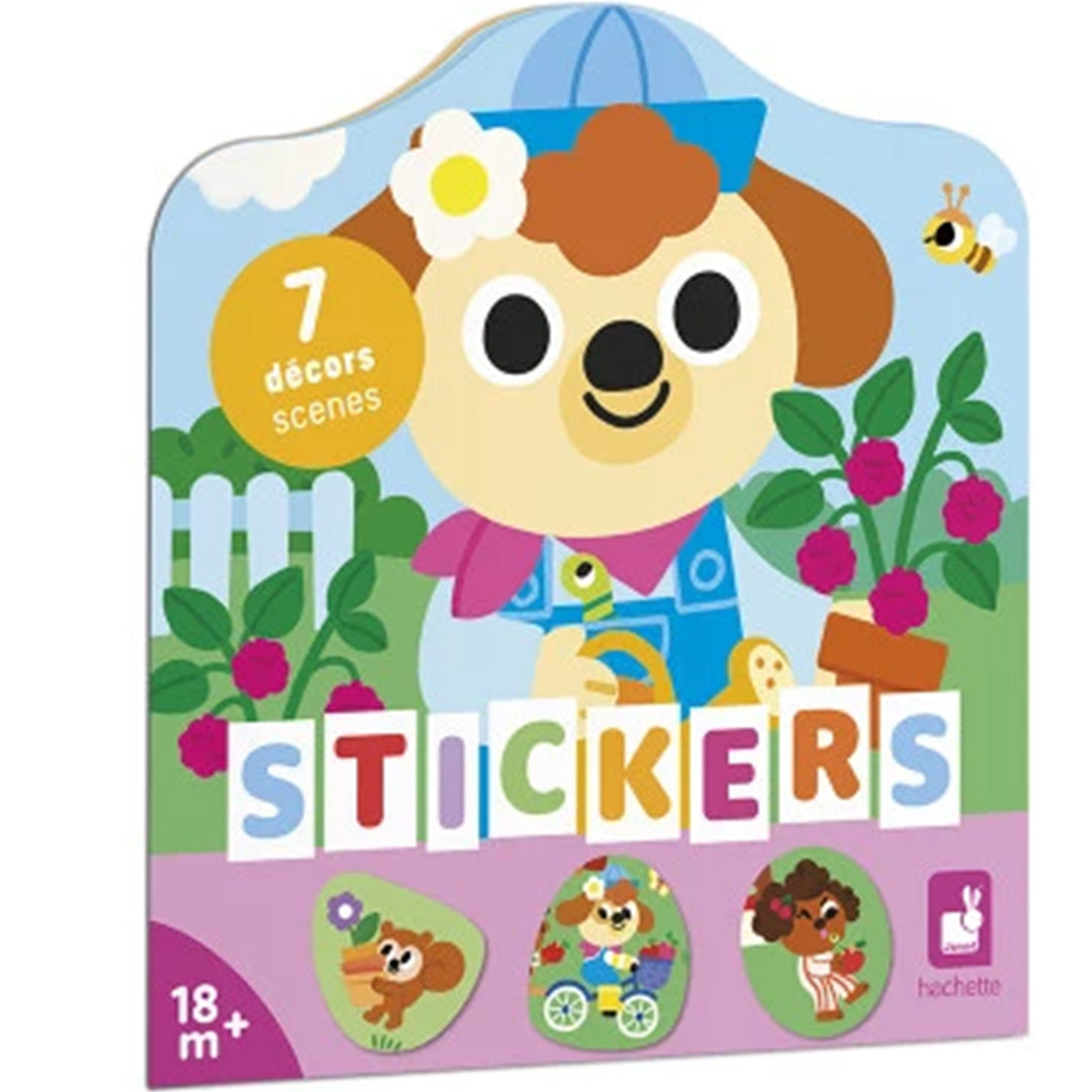 Janod stickerboek 'De Tuin' met een vrolijke hond in een tuin op de voorkant.