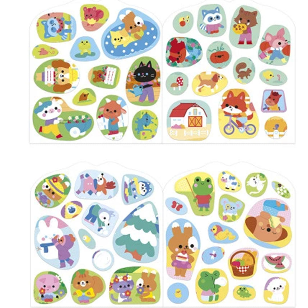 Vellen met diverse Janod stickers van dieren en plattelandselementen.