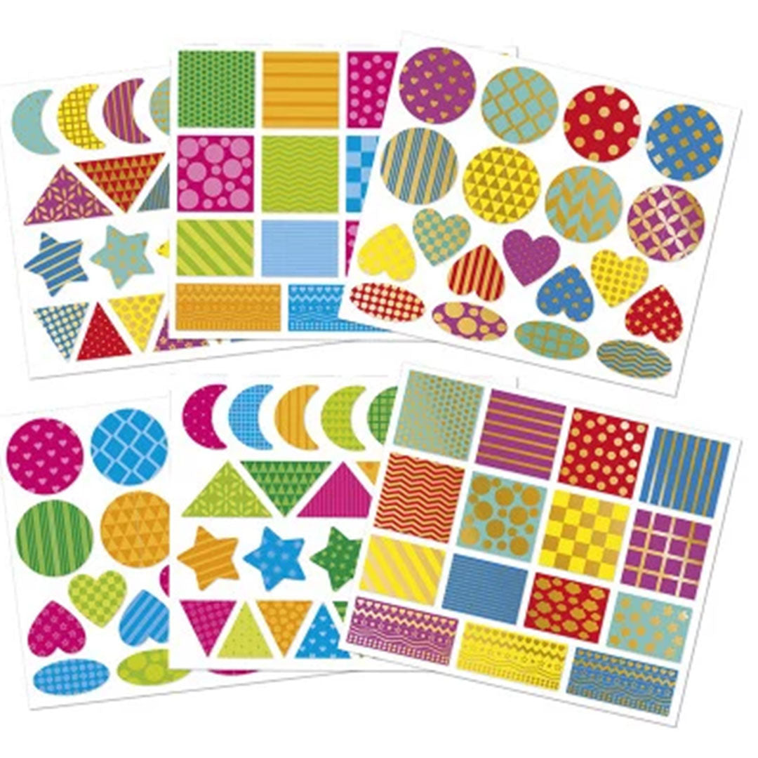 Meerdere vellen met Janod stickers in diverse geometrische vormen en patronen.