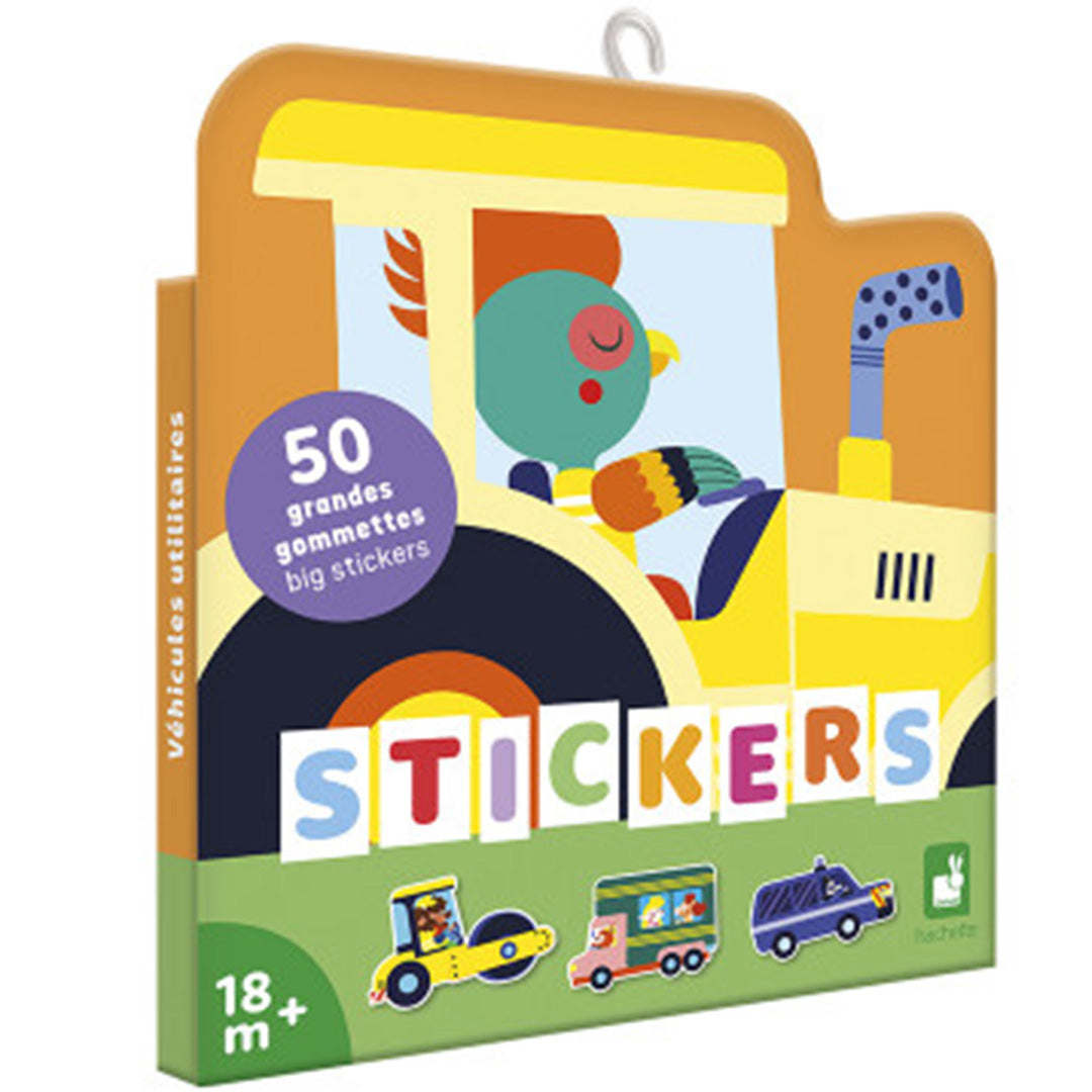 Janod stickers verpakking in de vorm van een gele tractor met een vogel als bestuurder en de tekst 'STICKERS' en '18 m+'.