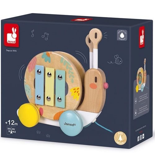 De verpakking van de Janod trekfiguur en muziekinstrument slak.