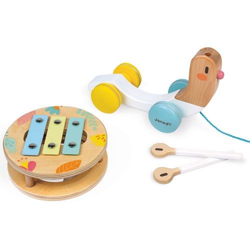 De Janod trekfiguur en muziekinstrument slak, gedemonteerd in de slak zonder schild en het losse xylofoon schild met de speelstokjes.