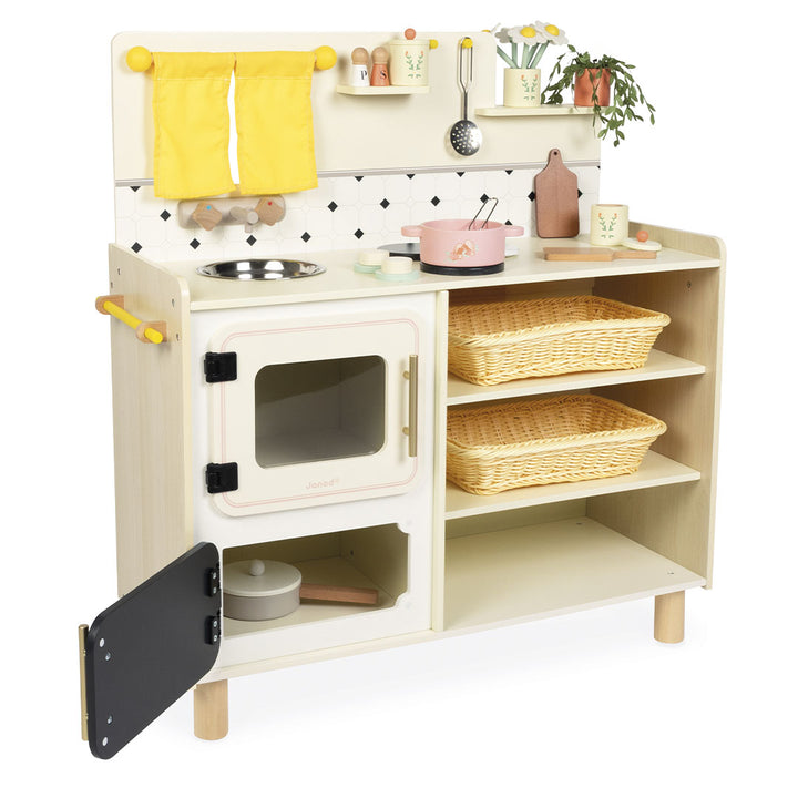 Janod kinderkeuken met oven, planken en diverse accessoires.