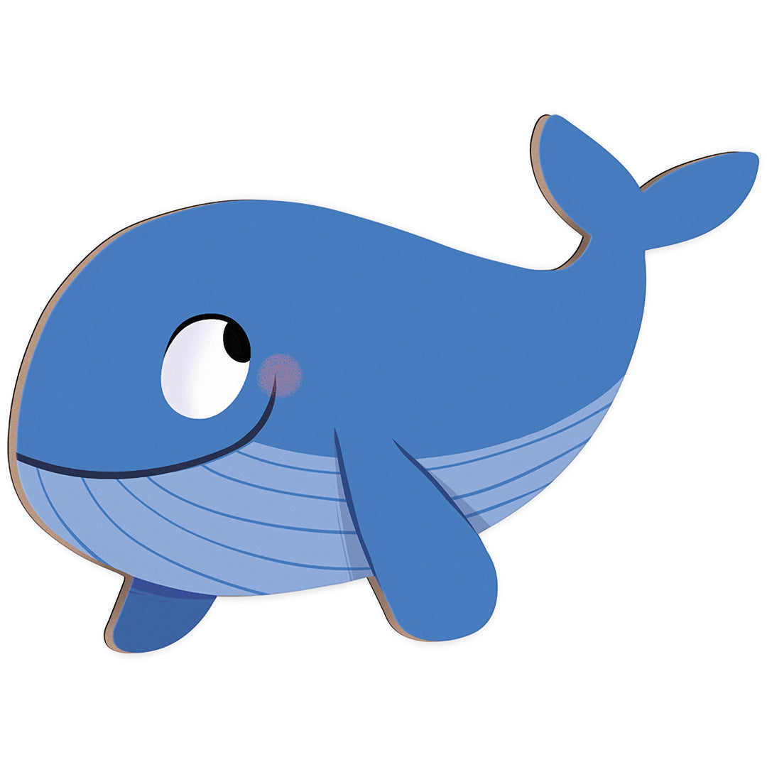Een close-up van een blauwe walvis magneet met een lachend gezicht.