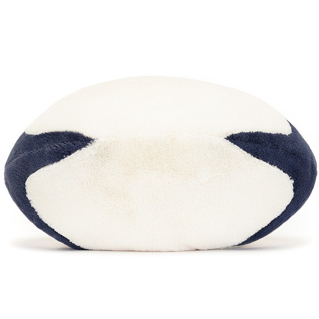 Bovenaanzicht van de Jellycat amuseables knuffel rugbybal met witte en donkerblauwe vlakken.