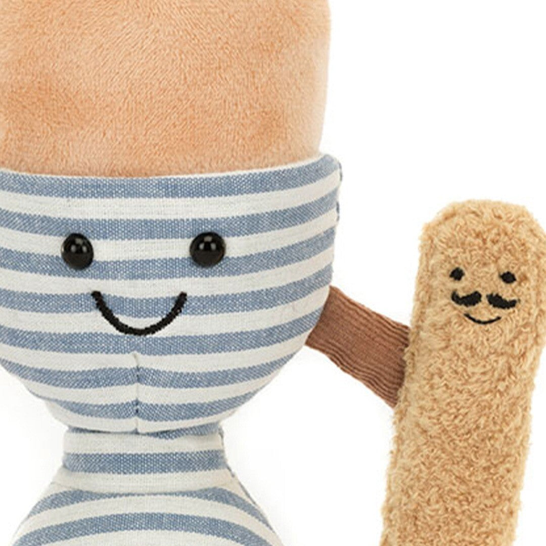 Detail van het gezicht van het Jellycat knuffelei en het knuffelsoldaatje.