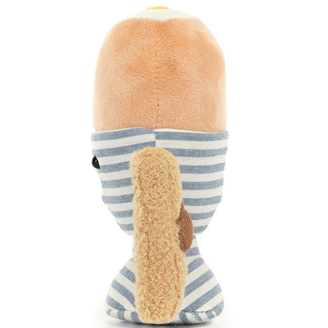 Achterkant van het Jellycat knuffelei in gestreepte eierdop met knuffelsoldaatje.