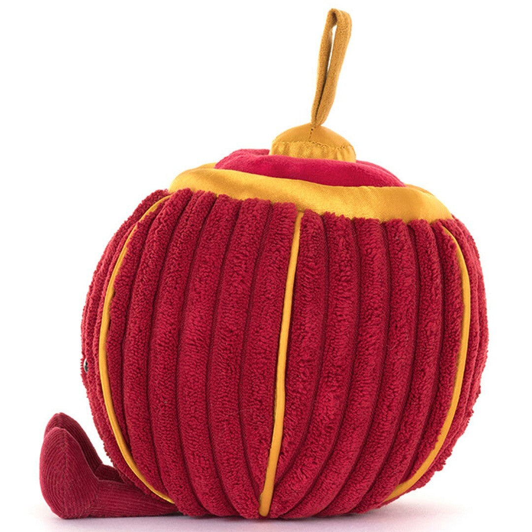 Zijaanzicht van de Jellycat amuseables knuffellantaarn Rayray, een rood pluchen lantaarn met geel detail.