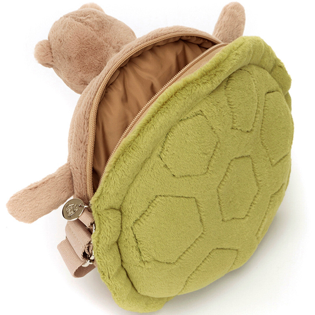 De Jellycat schildpad kindertas van bovenaf gezien met open rits en de bruine binnenkant.