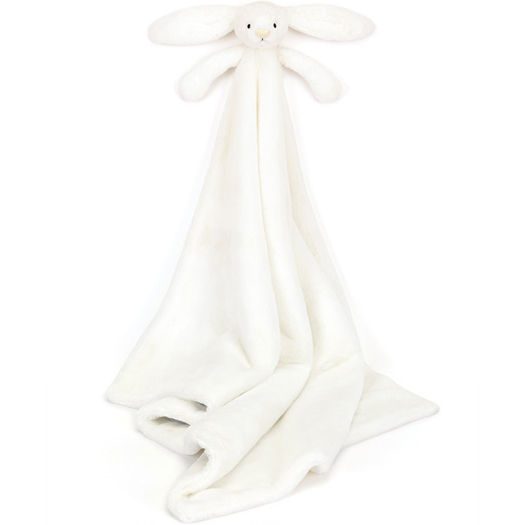 Jellycat knuffeldekentje bashful konijn, een wit pluchen dekentje met een konijnenhoofdje en armpjes bovenaan, verticaal hangend.