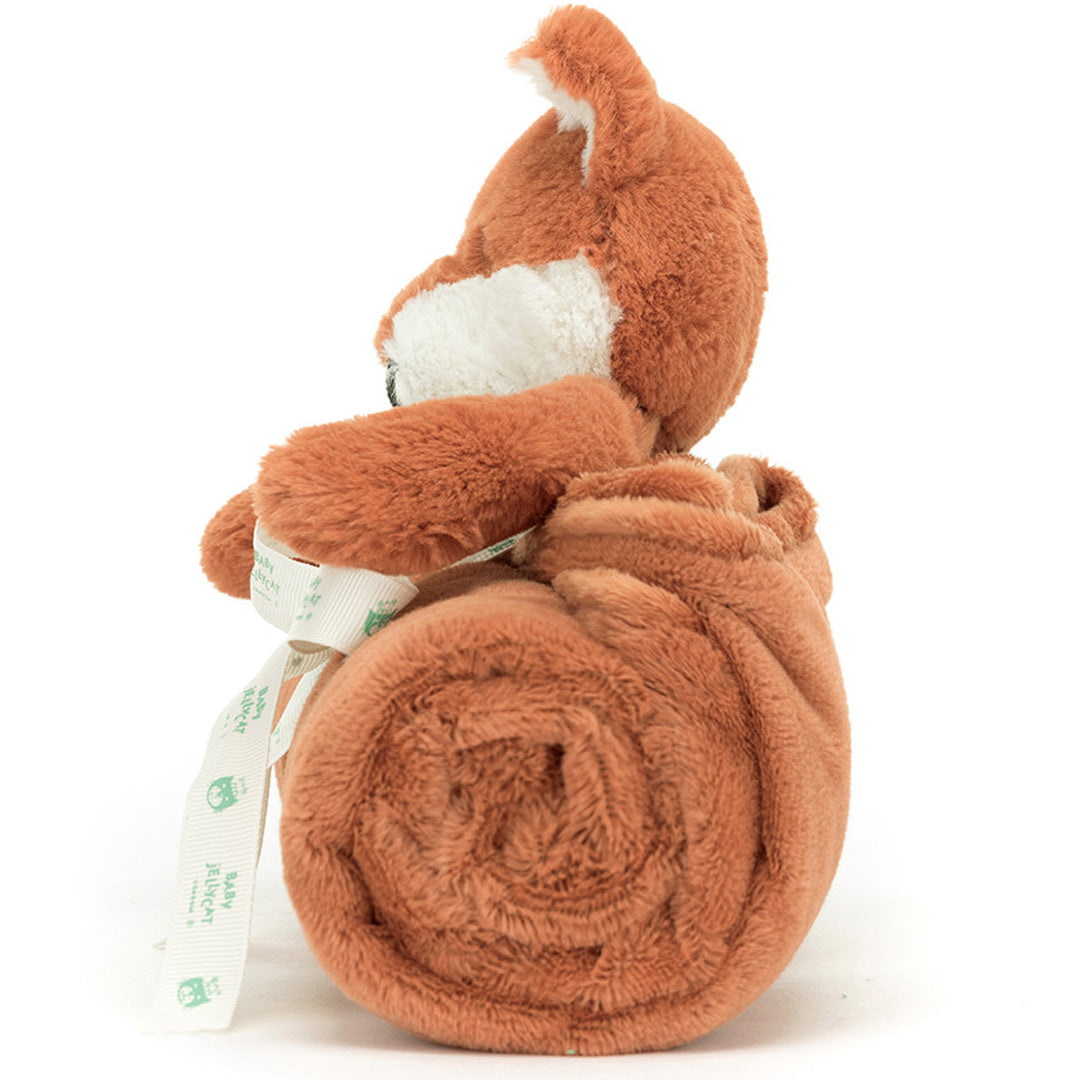 Jellycat knuffeldekentje in de vorm van een vos, opgerold en van de zijkant gezien.