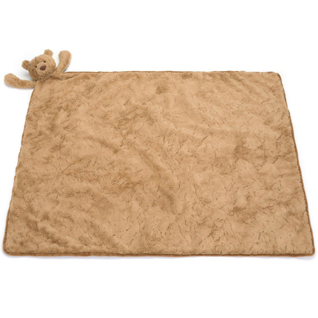 Jellycat knuffeldekentje met een bruine pluchen beer aan de hoek, plat uitgespreid met een textuurpatroon.
