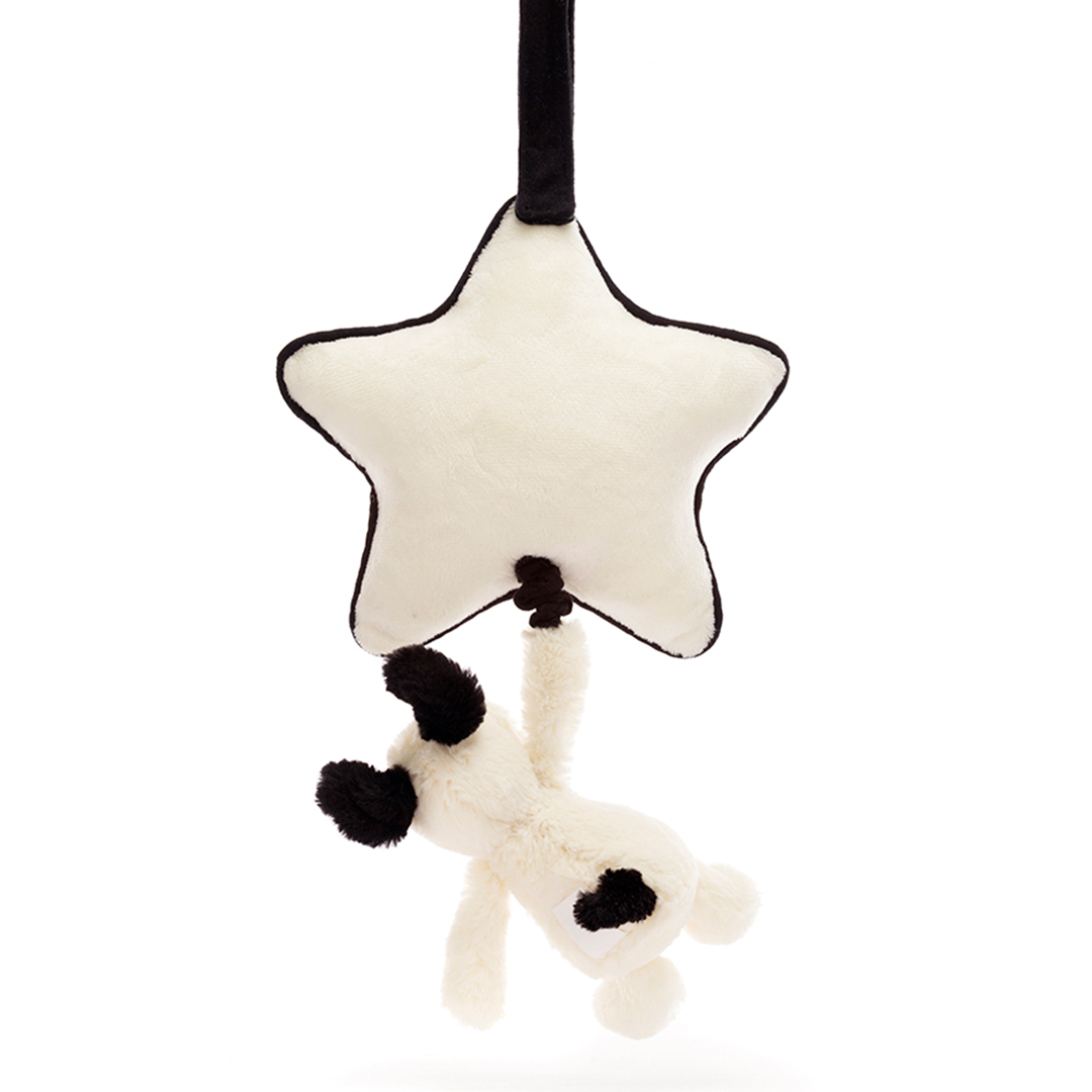 Jellycat babyspeelgoed muziekdoosje met een hangende beige ster en een puppy met zwarte vlekken.