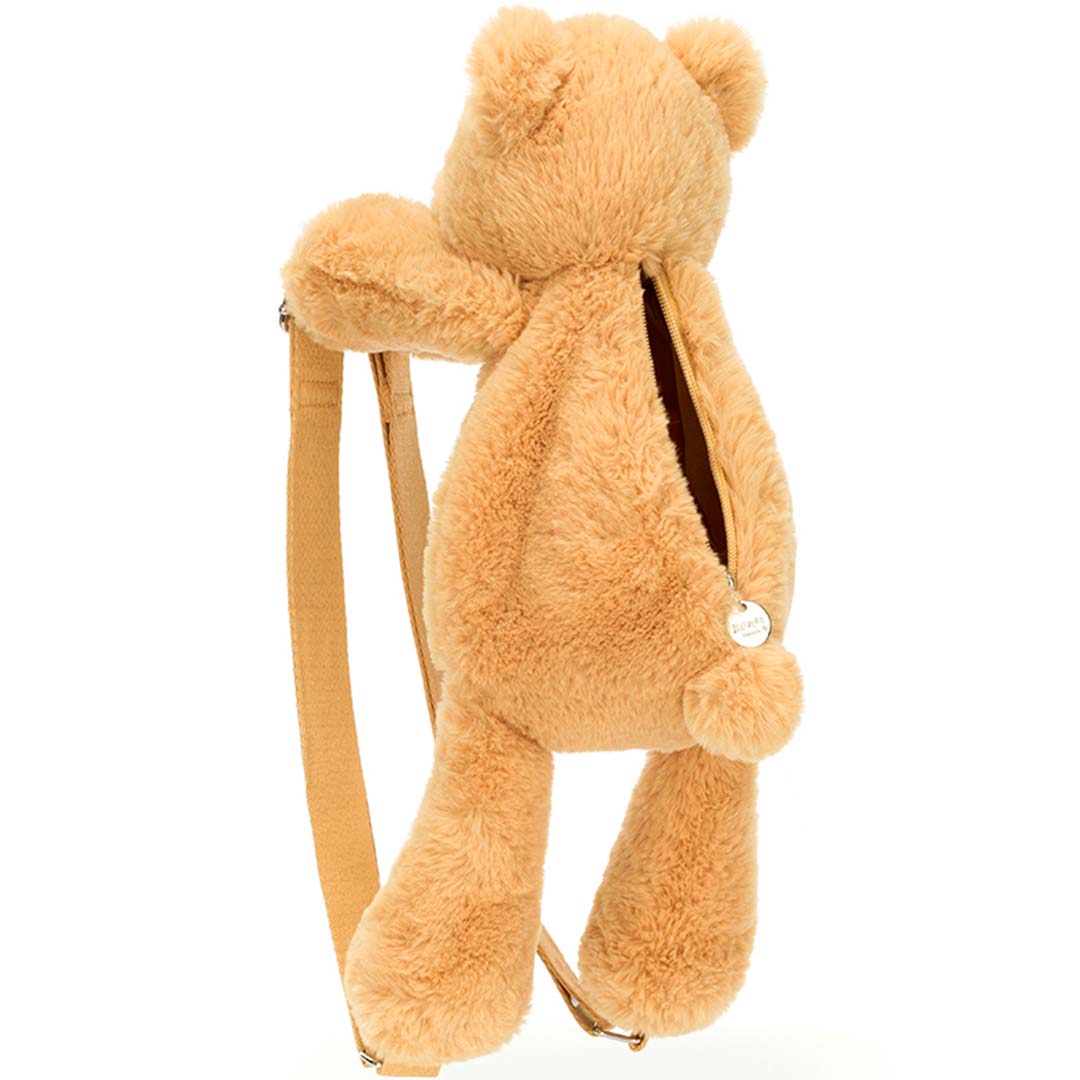 Jellycat peuterrugzak in de vorm van een lichtbruine knuffelbeer, van achteren gezien met de open rits op de rug.