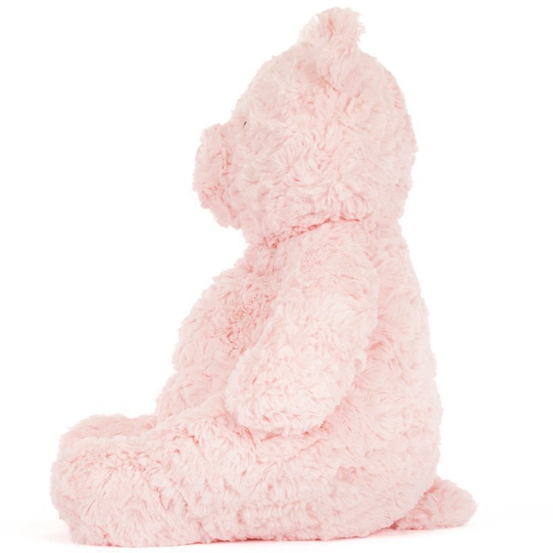 Jellycat roze pluchen knuffelbeer Leola, van de zijkant gezien.