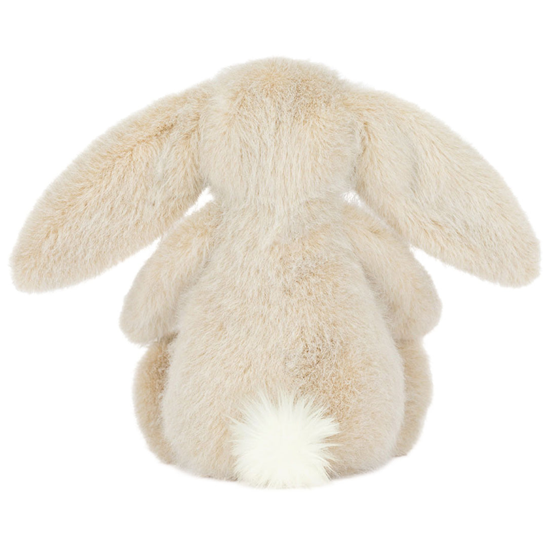 Achteraanzicht van de beige Jellycat Flufflet Bunny pluchen speelgoed, zittend met een pluizig wit staartje.