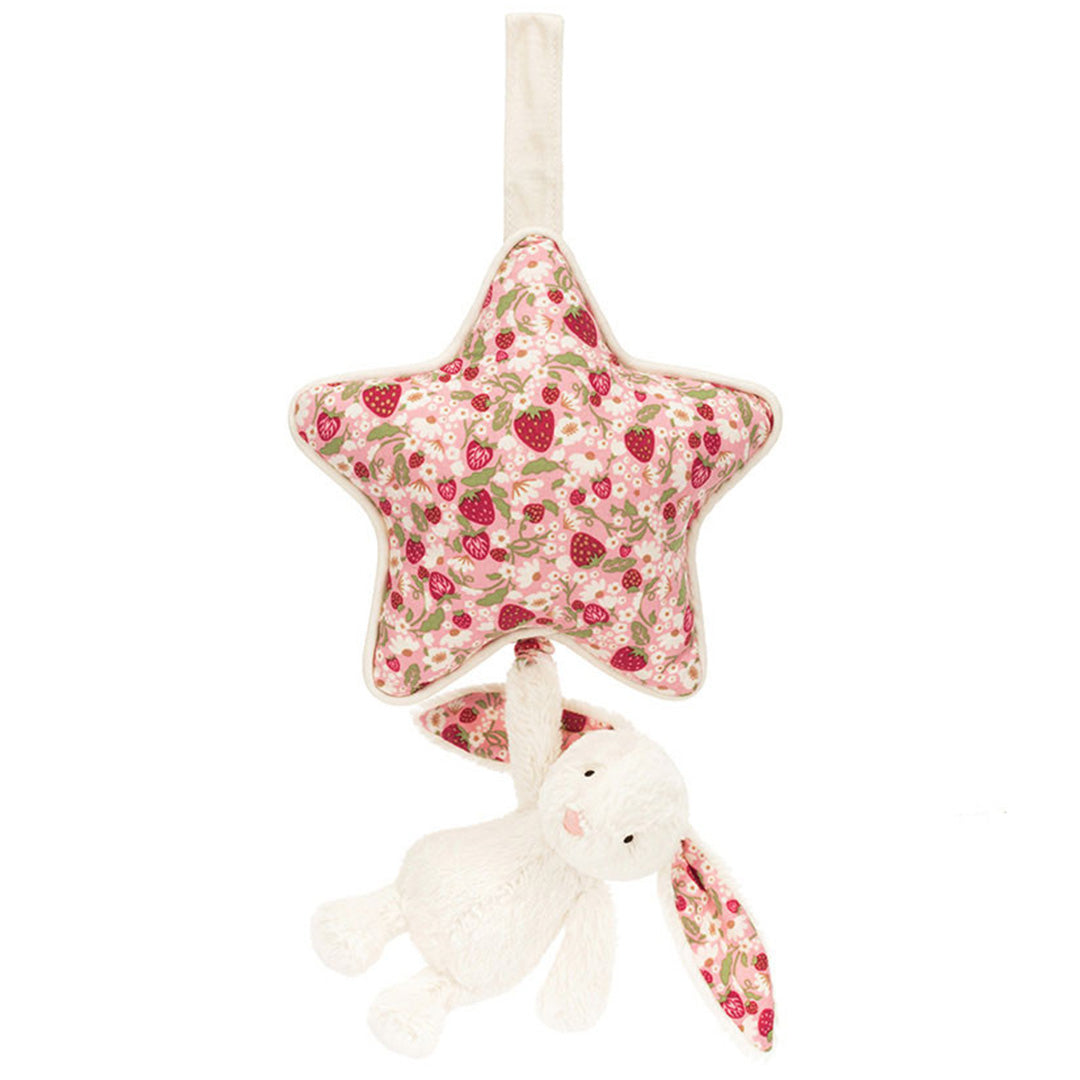 Jellycat babyspeelgoed muziekdoosje met een roze ster met aardbeienpatroon en een crèmekleurig pluche konijn.