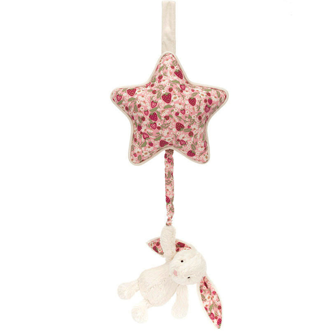Jellycat babyspeelgoed muziekdoosje met een roze ster met aardbeienpatroon en een crèmekleurig pluche konijn.