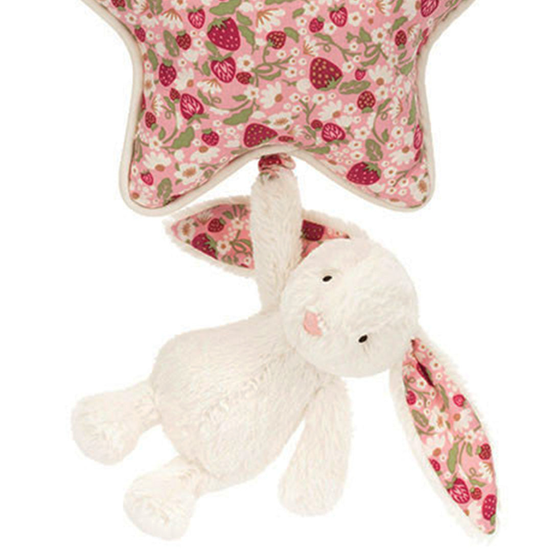 Detail van het pluche konijn met bloemenoren dat hangt aan de roze ster van het Jellycat babyspeelgoed muziekdoosje.