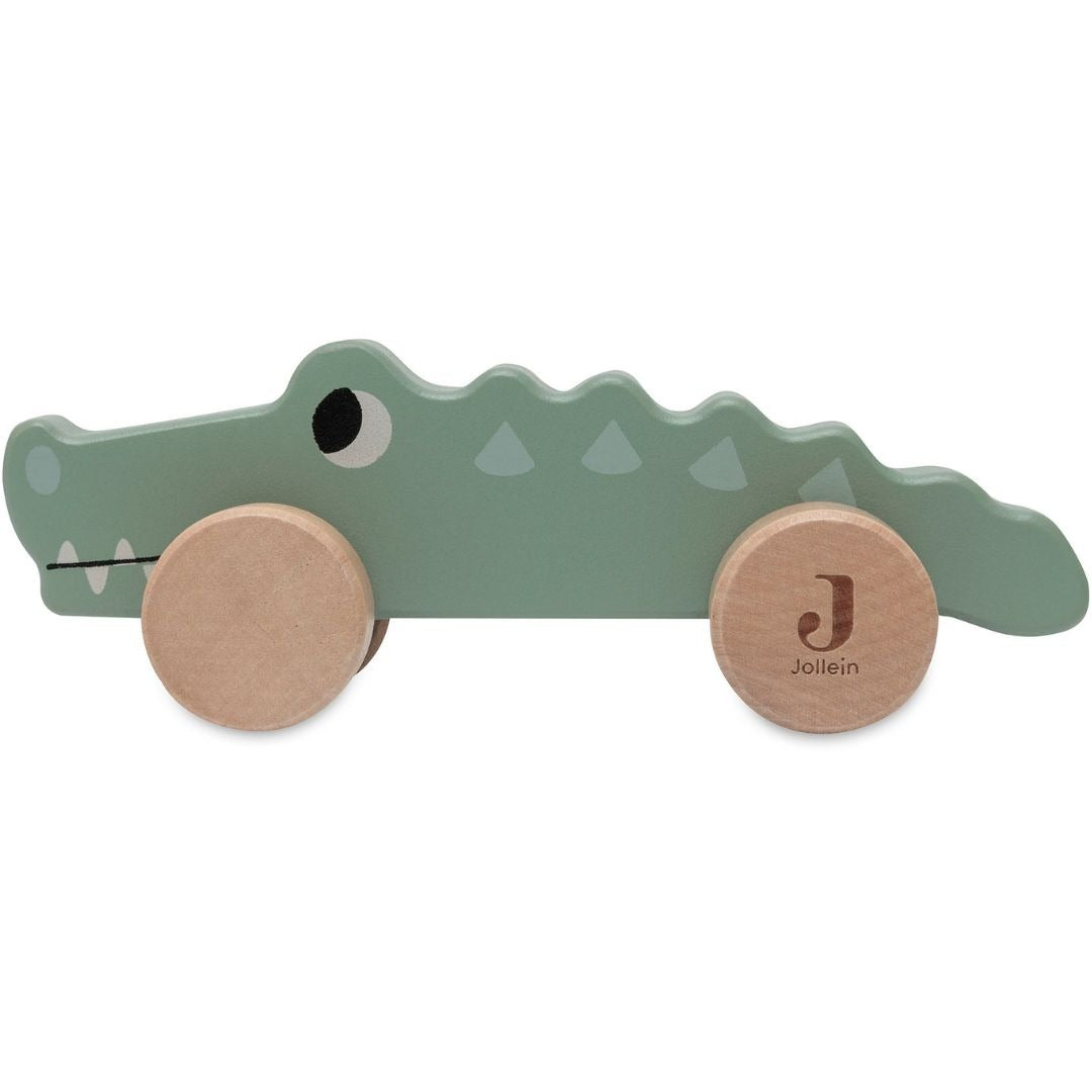 Jollein houten duwfiguur krokodil met groene body en houten wielen.