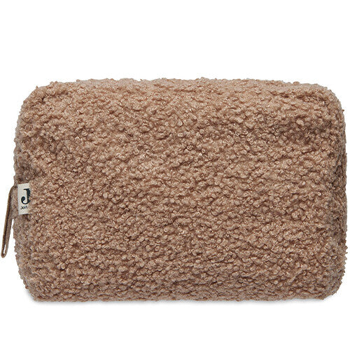 Jollein bouclé toilettas in biscuit kleur, recht van voren gefotografeerd.