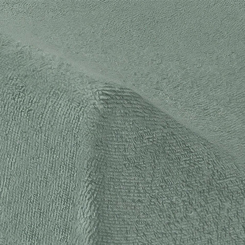 Detail van de ash green badstof stof van een Jollein verschoonkussenhoes.