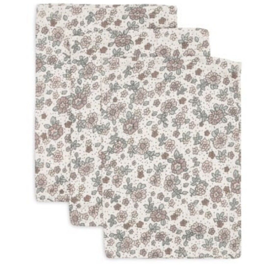 Drie Jollein hydrofiele washandjes met retro bloemenpatroon.