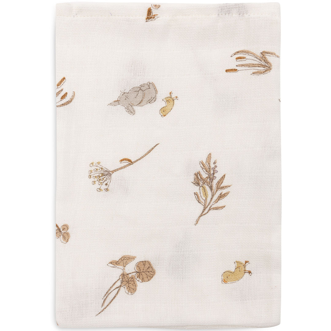 Eén opgevouwen Jollein hydrofiel washandje met een beige patroon van rivierdiertjes en planten.