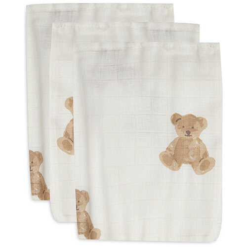 Drie Jollein beige hydrofiele washandjes met teddybeerprint, schuin gestapeld.