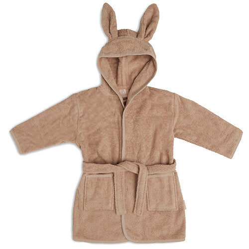 Jollein kinderbadjas in biscuitkleur met konijnenoren op de capuchon, plat gefotografeerd.