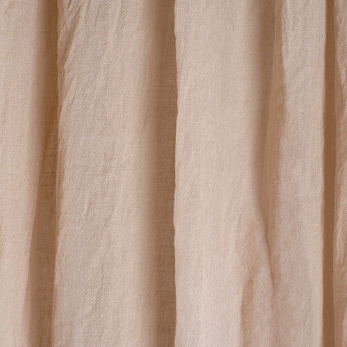 Detail van de stof van de Jollein beige bedhemel, met zichtbare textuur.