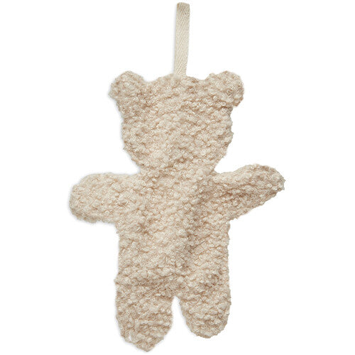 Achterkant van de jollein speendoek in de vorm van een beige teddybeer met een merklabel aan de zijkant.