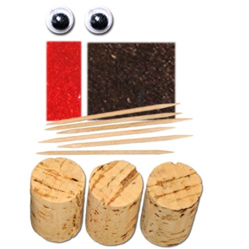 Detailfoto van de onderdelen van de DIY kurken hond knutselset, inclusief kurk, ogen en stokjes.