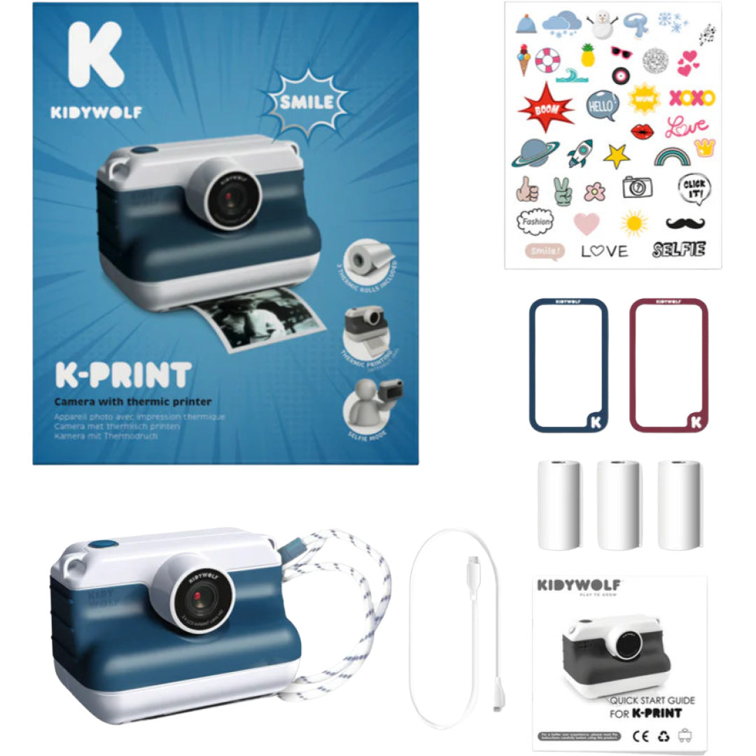 Een overzicht van de Kidywolf kindercamera met thermische printer en bijbehorende accessoires zoals stickers, fotopapier en een oplaadkabel.