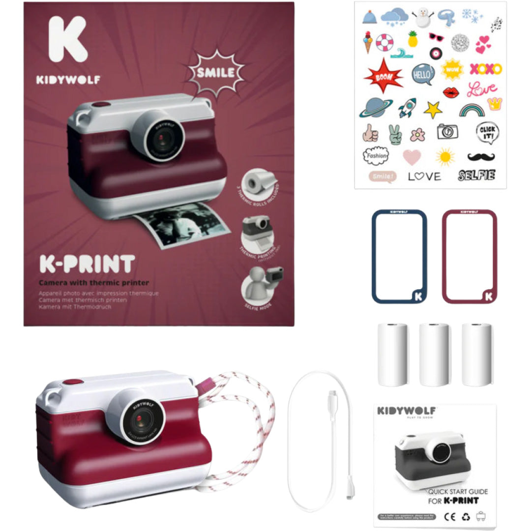 Een overzicht van de Kidywolf kindercamera met accessoires zoals thermisch papier, stickers en een oplaadkabel.