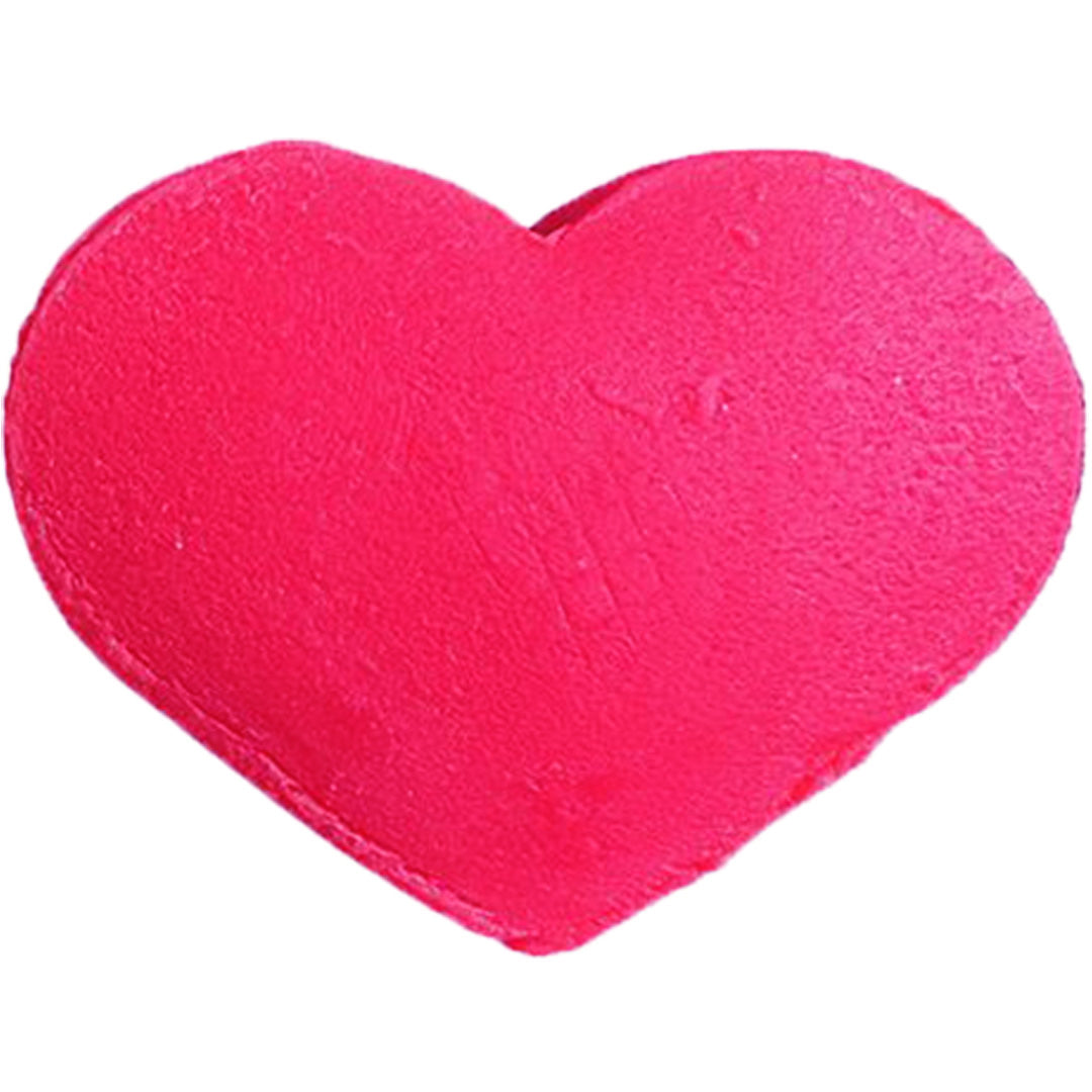 Roze speelklei in de vorm van een hart.